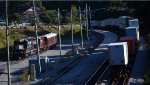 Rear of NS train 25A passes the NS research train.